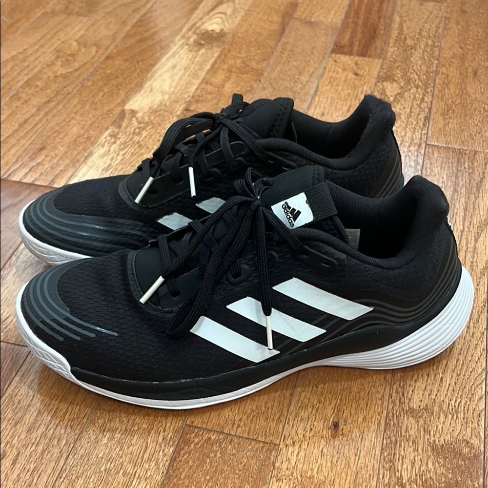 Adidas Volleyball shoes. Women’s size 8.5. Black and White.